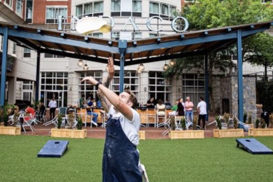 Chef Tossing a Pizza Dough